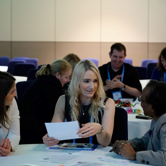 Groups Working Together At SET Conference Session